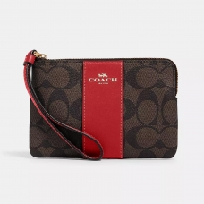 Coach Corner Zip Wristlet сумочка на запястье, коричневая с красным