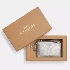 Coach コーナージップリストレット 真珠色の署名によって塗られるキャンバスおよびcrossgrainの革 シルバー/グレー