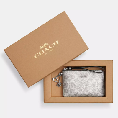 Coach コーナージップリストレット 真珠色の署名によって塗られるキャンバスおよびcrossgrainの革 シルバー/グレー