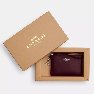 Coach 箱入り コーナージップリストレット 魅力の滑らかな革/銀/赤ワイン